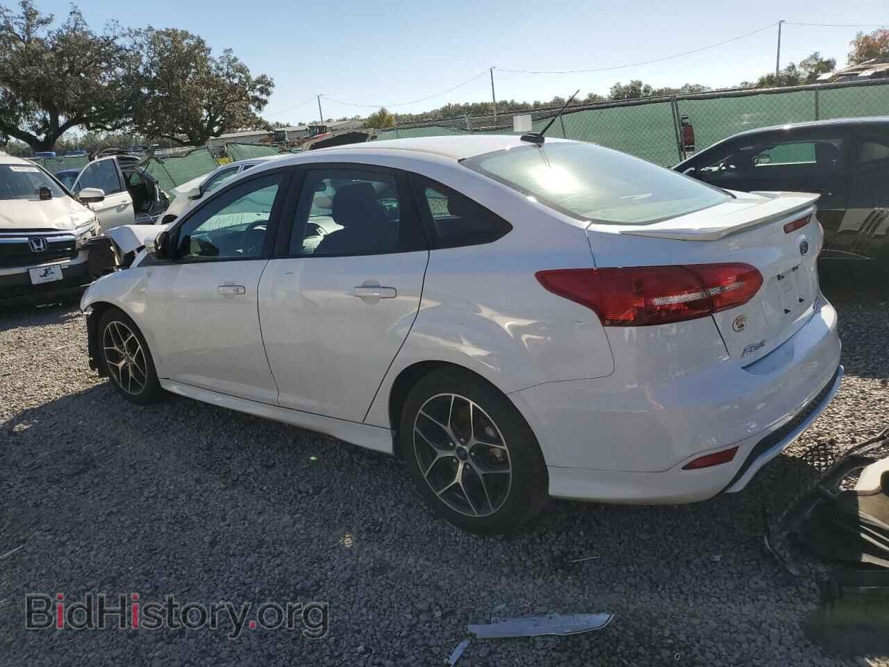 2016 FORD FOCUS - VIN: 1FADP3F27GL304710 - Photo 2