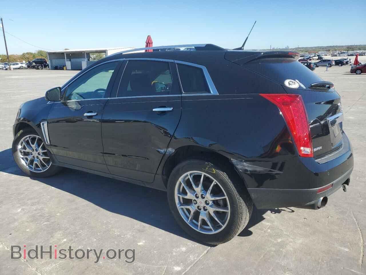 2014 CADILLAC SRX - VIN: 3GYFNCE39ES631940 - Photo 2