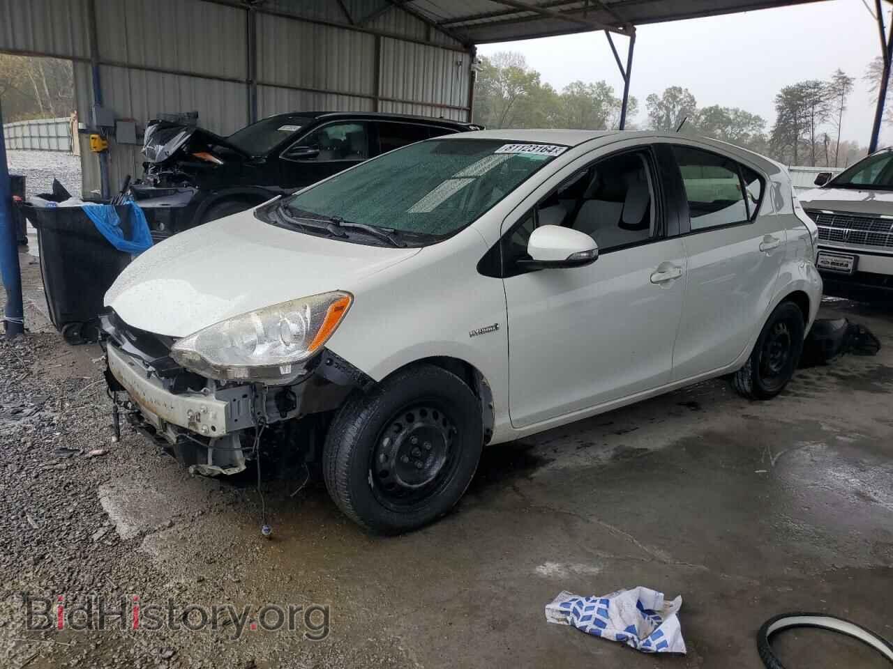 Фотография JTDKDTB33E1075184 - TOYOTA PRIUS 2014