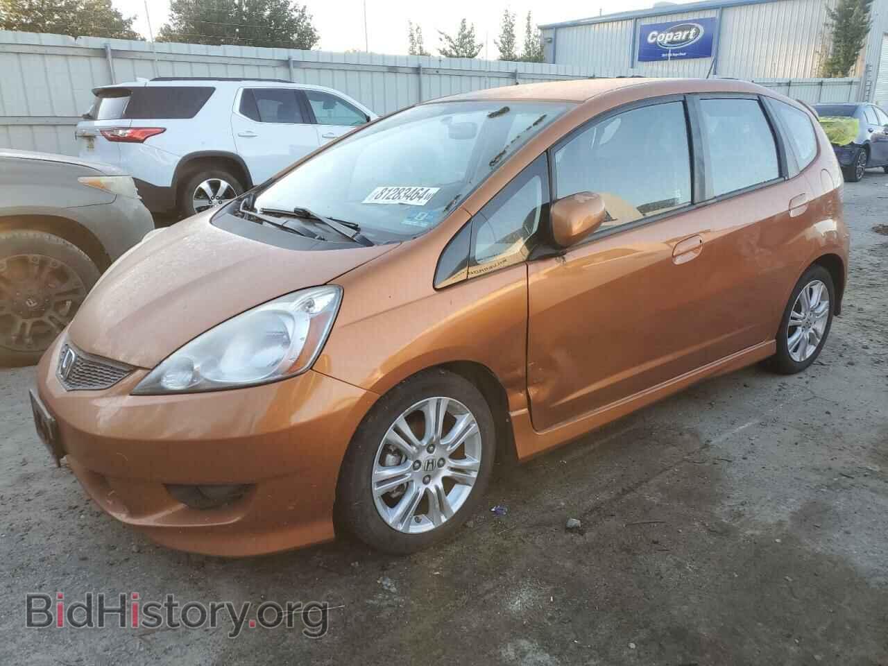 Фотография JHMGE8H57BC005498 - HONDA FIT 2011