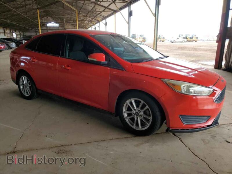 2016 Ford FOCUS (VIN 1FADP3F20GL271565) — фото 4 из 12