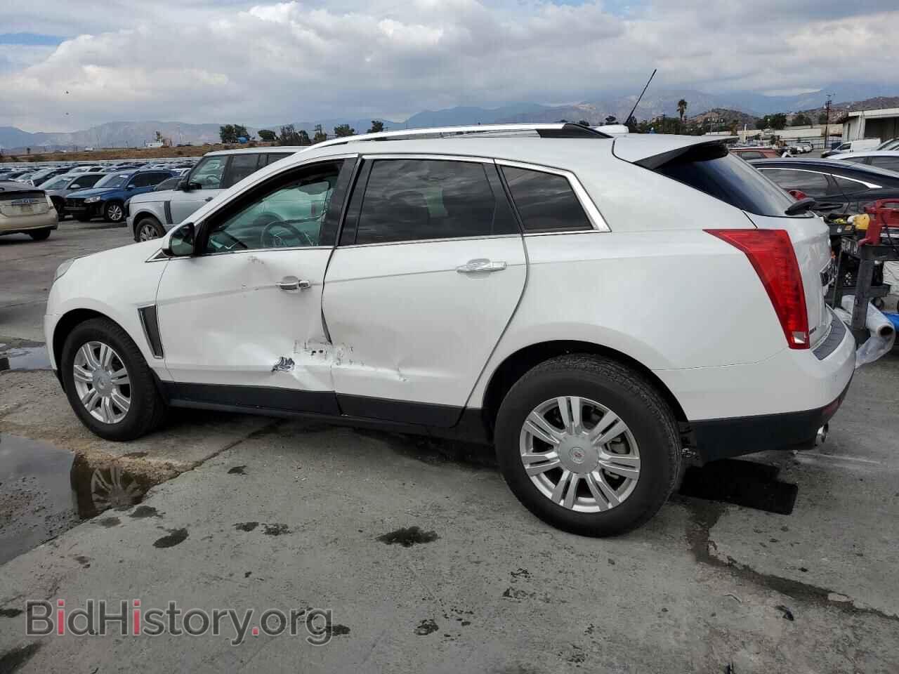 2016 CADILLAC SRX - VIN: 3GYFNBE31GS585629 - Фото 2
