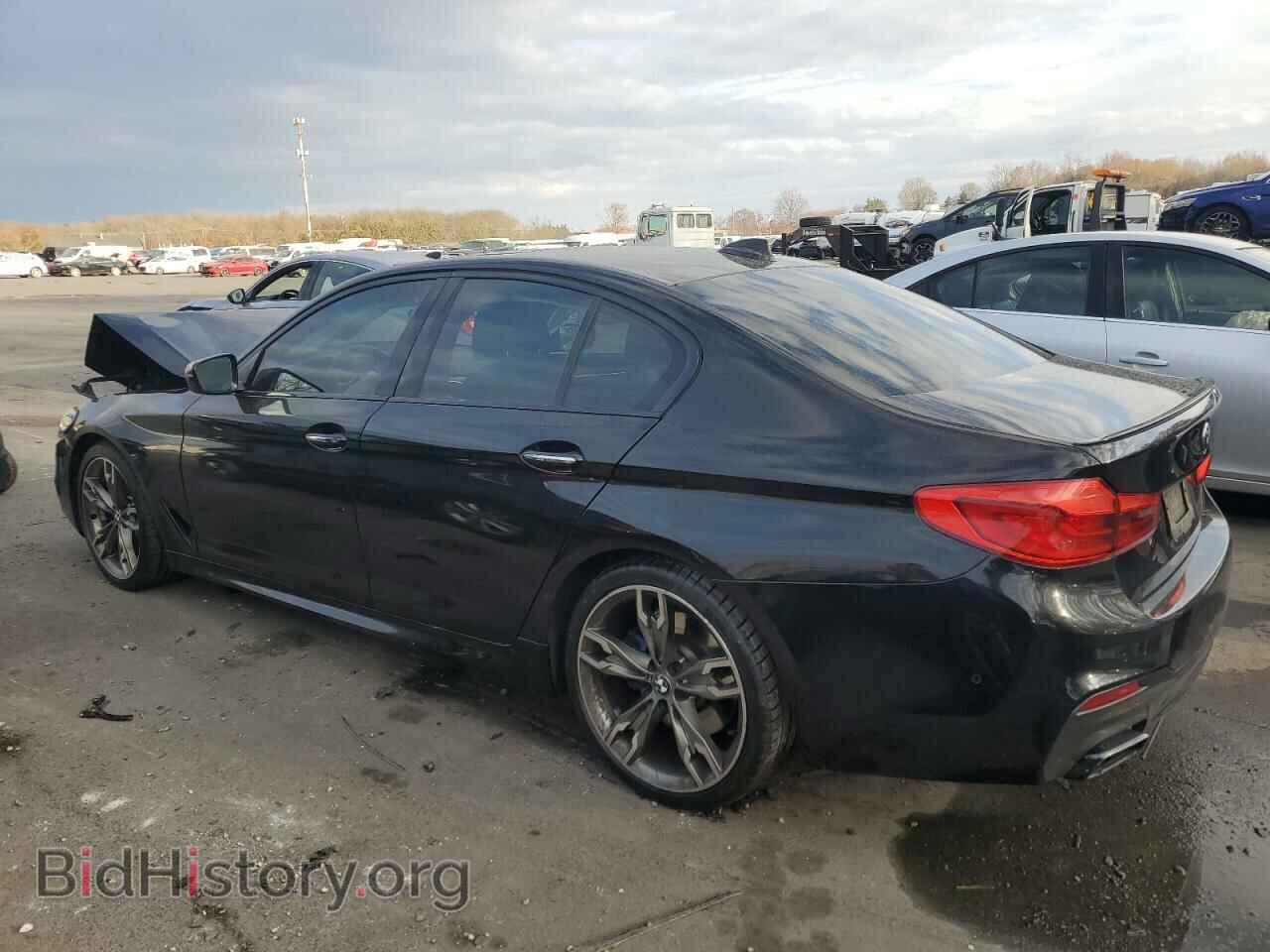 2018 BMW M5 - VIN: WBAJB9C57JB049127 - Фото 2