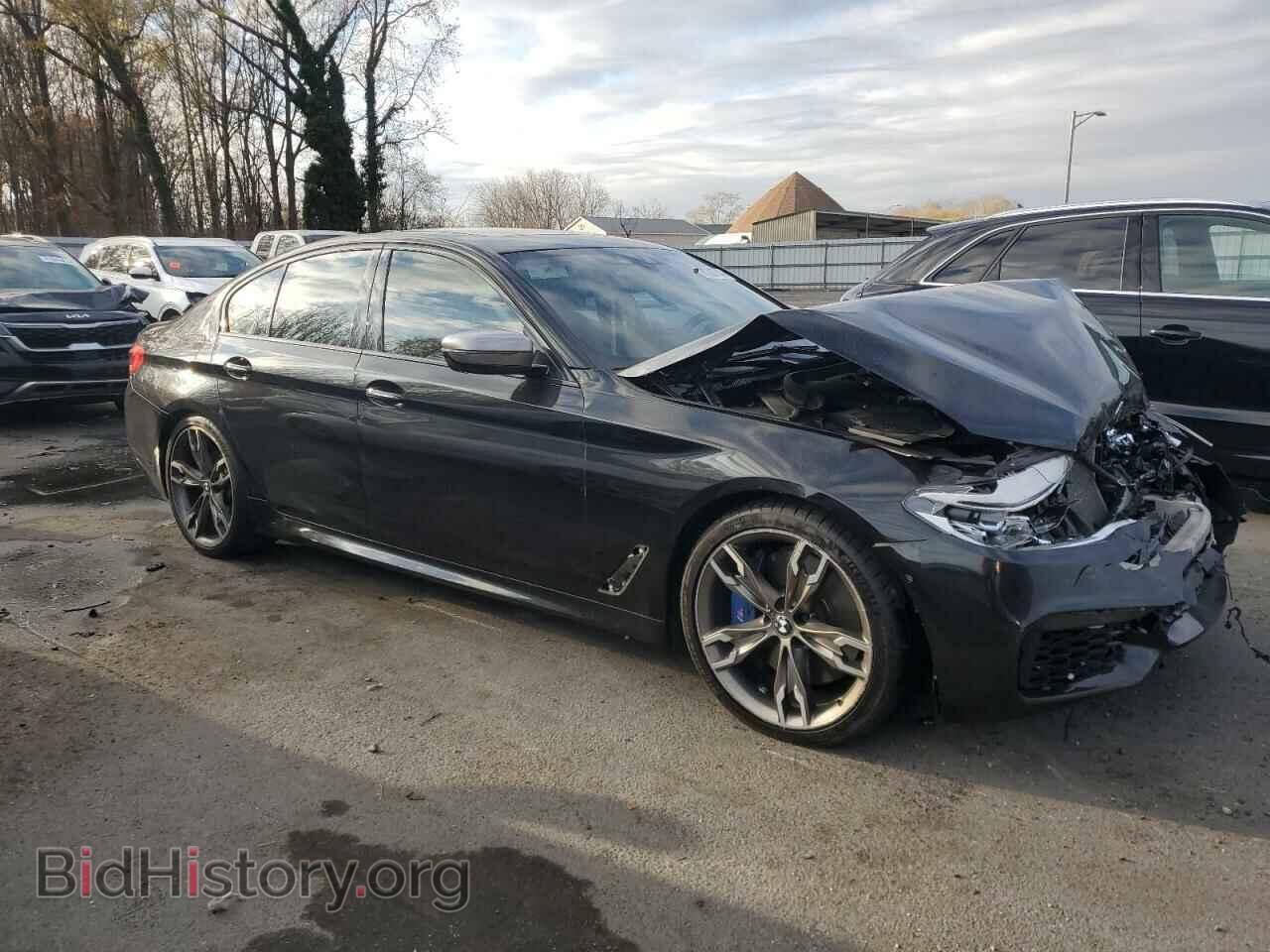 2018 BMW M5 - VIN: WBAJB9C57JB049127 - Фото 4