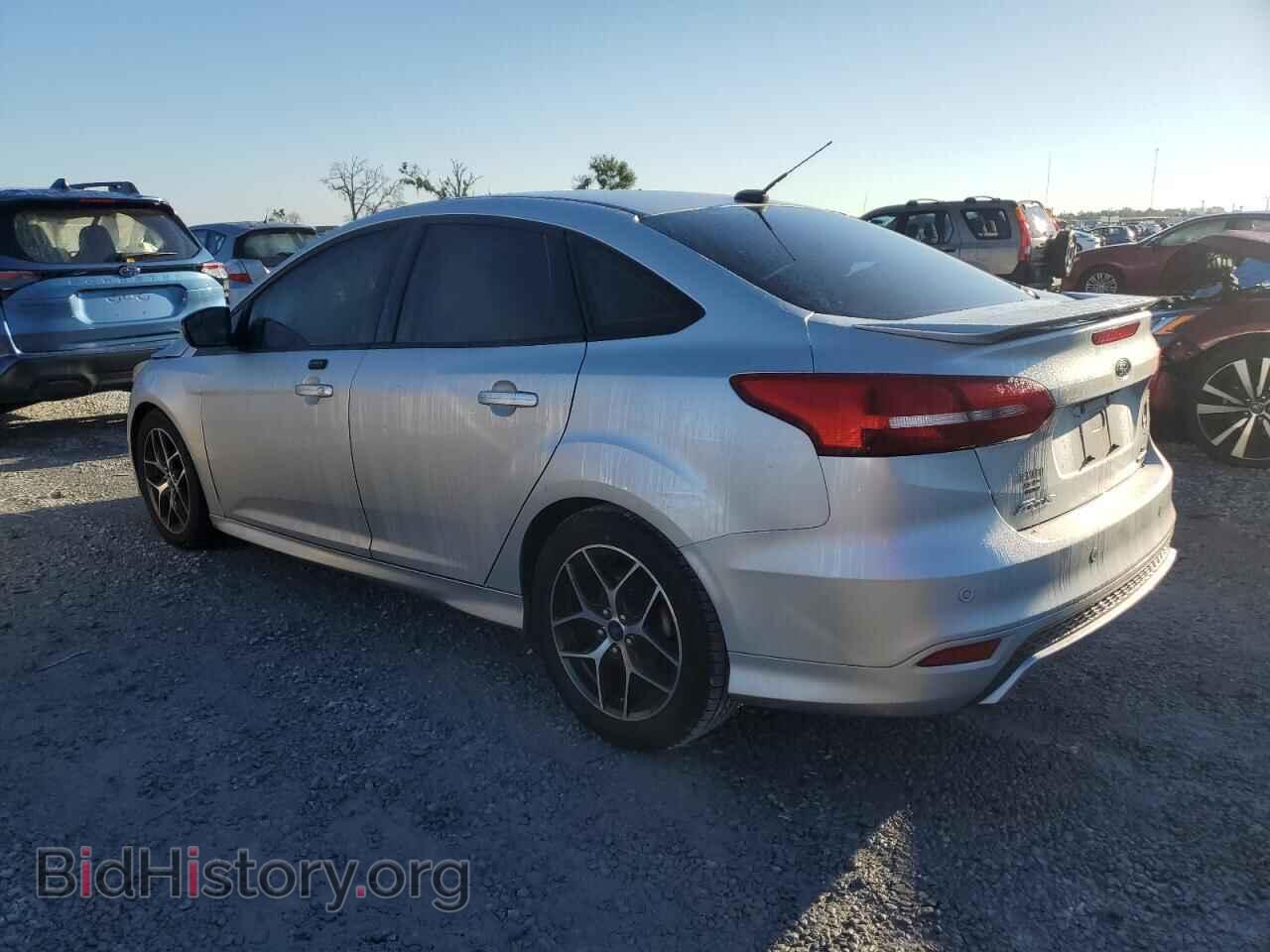 2016 FORD FOCUS - VIN: 1FADP3F26GL242135 - Фото 2