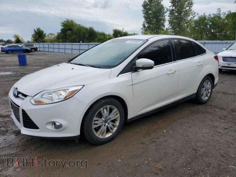 2012 Ford FOCUS SEL (VIN 1FAHP3H29CL406311) — photo 1 of 12, Copart, damage: rear end