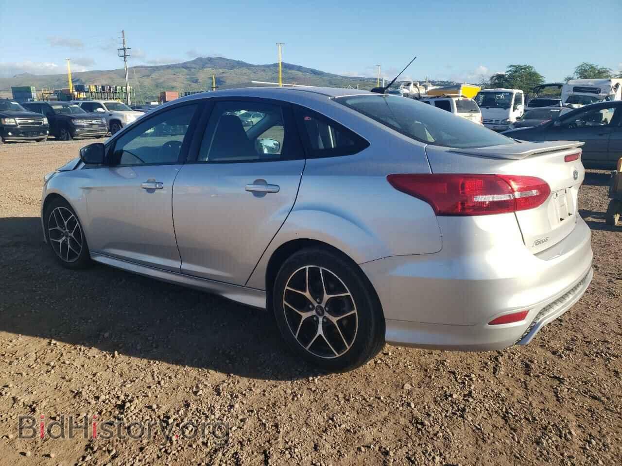 2016 FORD FOCUS - VIN: 1FADP3F21GL221564 - Фото 2
