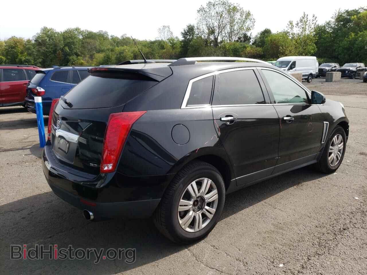 2014 CADILLAC SRX - VIN: 3GYFNEE39ES598918 - Фото 3