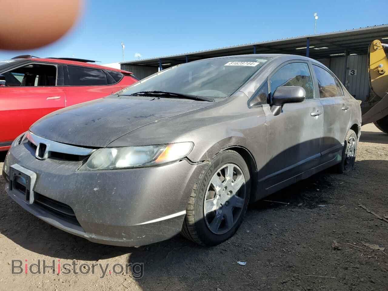 Фотография 19XFA1F59AE063154 - HONDA CIVIC 2010