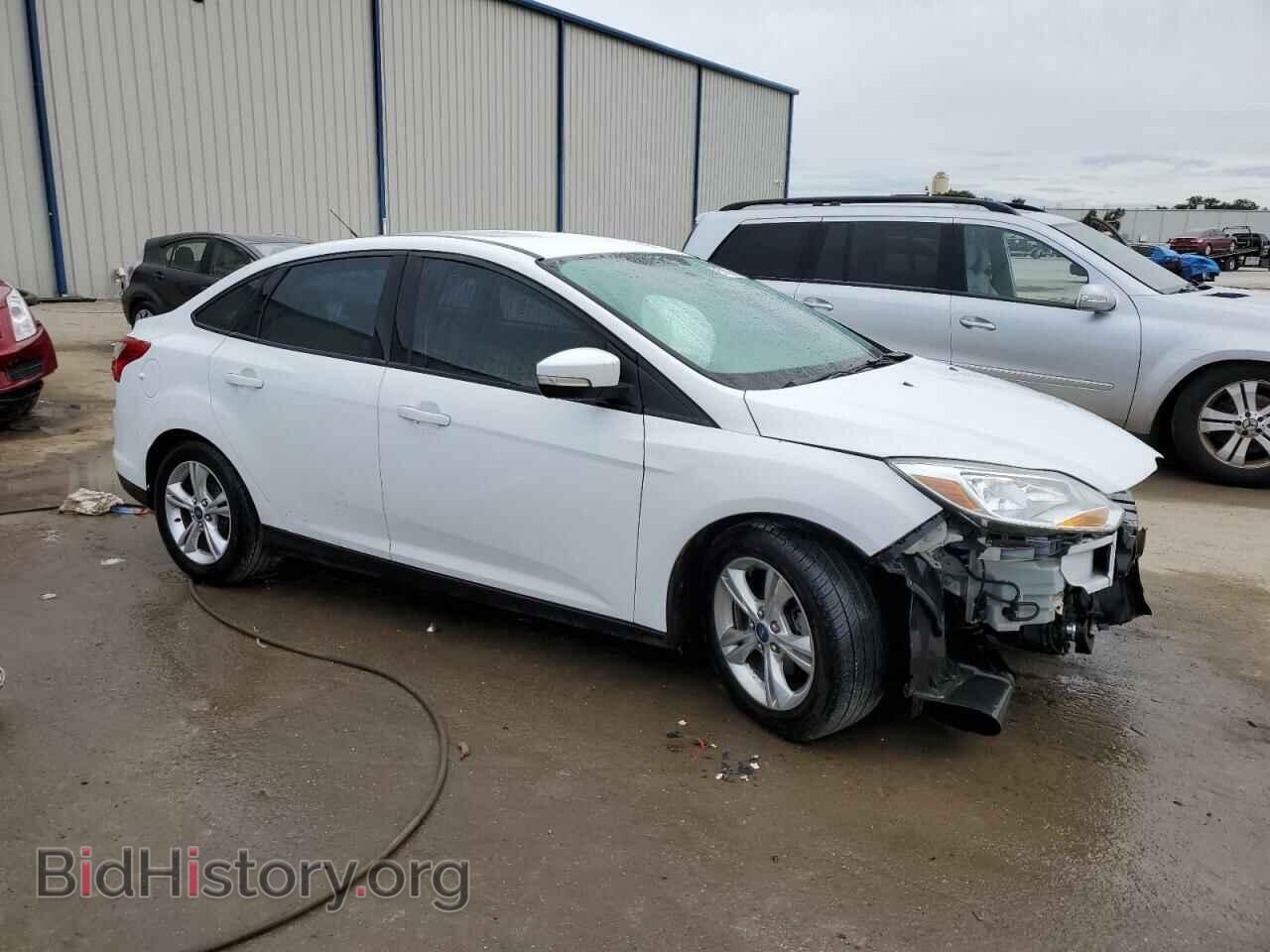 2014 FORD FOCUS - VIN: 1FADP3F21EL126709 - Photo 4