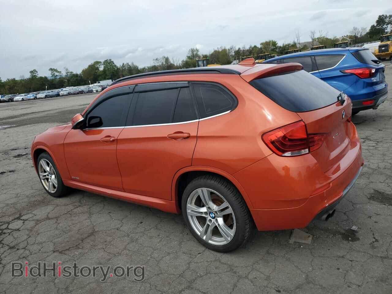 2014 BMW X1 - VIN: WBAVM1C50EVW48338 - Фото 2
