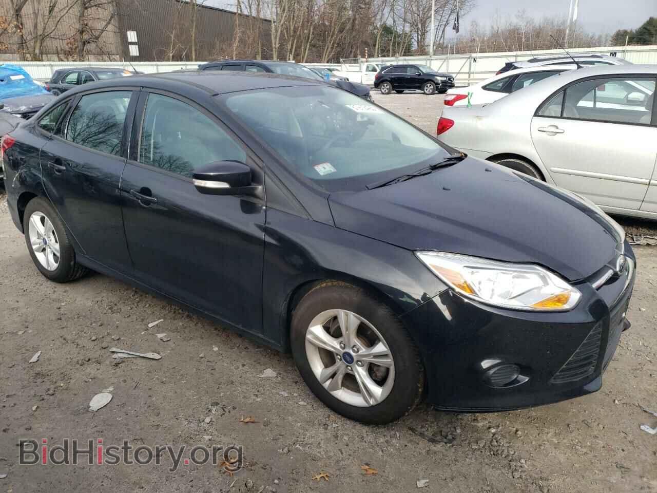 2014 FORD FOCUS - VIN: 1FADP3F2XEL214979 - Photo 4