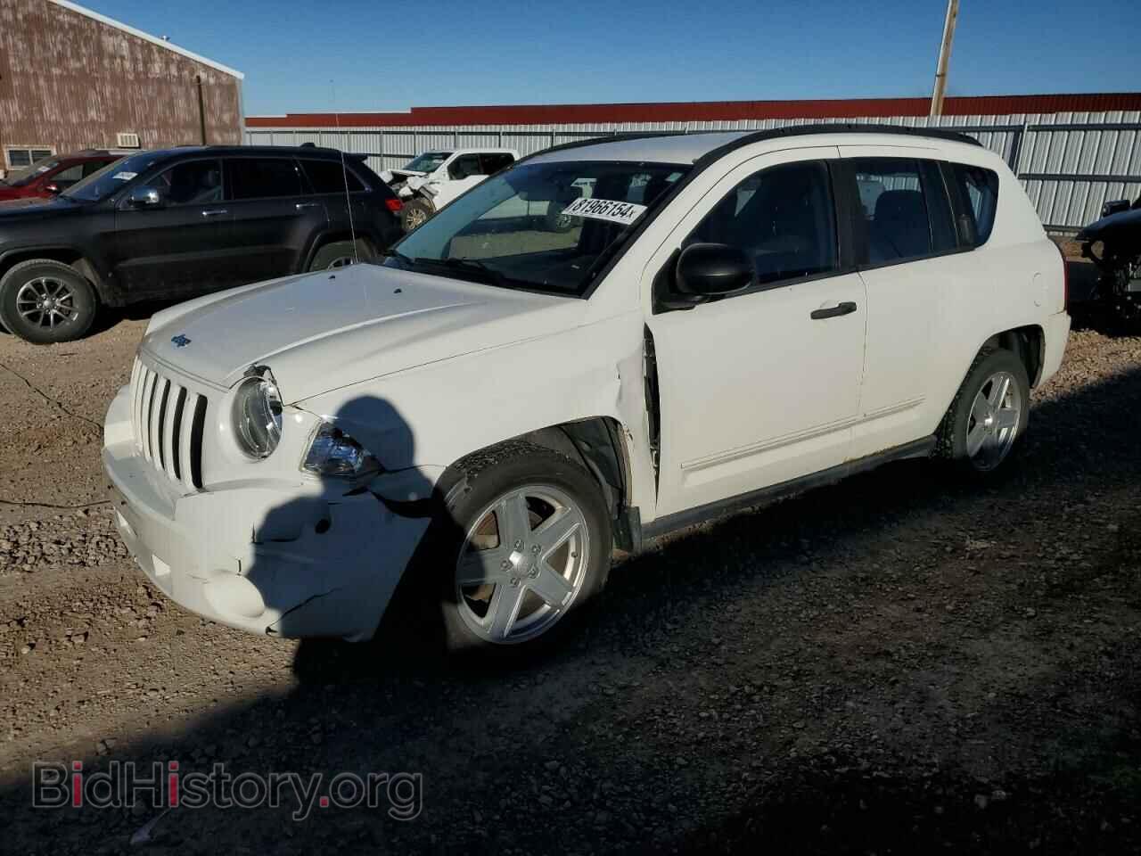 Photo 1J4NF4FB7AD503727 - JEEP COMPASS 2010
