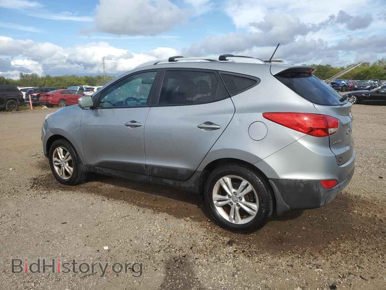 2012 HYUNDAI TUCSON - VIN: KM8JUCAC0CU397835 - Фото 2