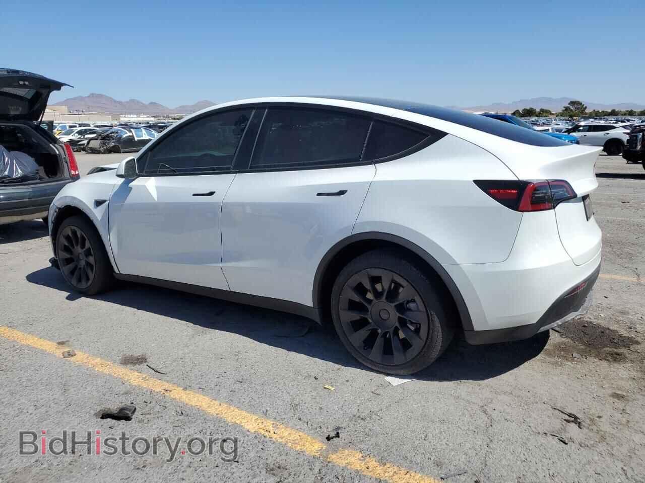 2023 TESLA MODEL Y - VIN: 7SAYGDEE9PF688489 - Фото 2
