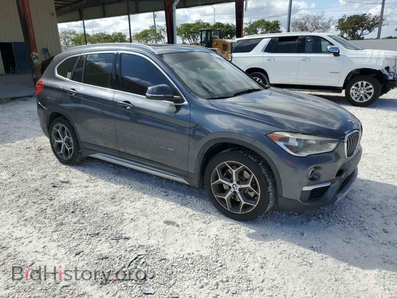 2017 BMW X1 - VIN: WBXHT3C39H5F68351 - Фото 4