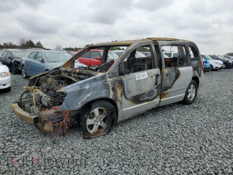 2010 Dodge CARAVAN SXT (VIN 2D4RN5D17AR215569) — photo 1 of 12, Copart, damage: burn
