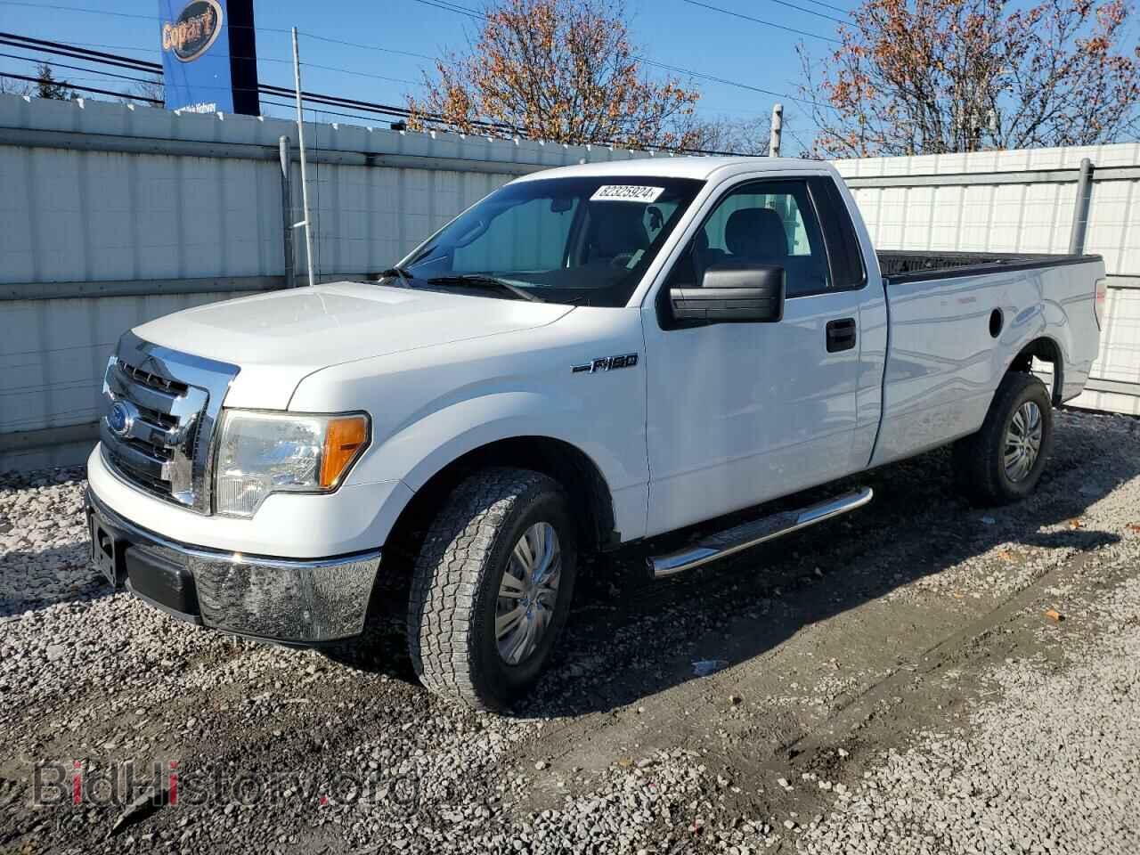 Photo 1FTNF1CF0BKD39388 - FORD All Models 2011