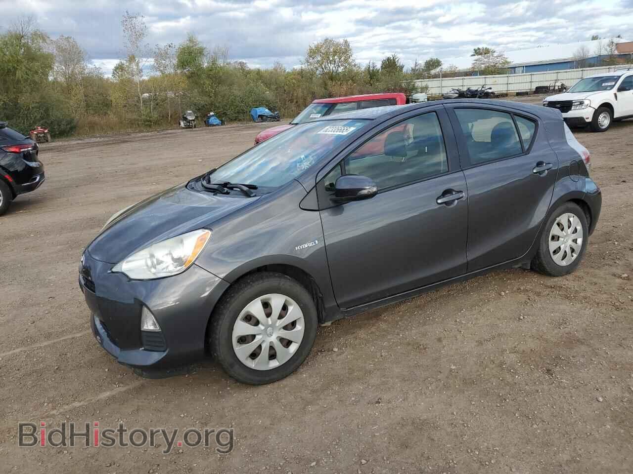 Фотография JTDKDTB32C1013384 - TOYOTA PRIUS 2012