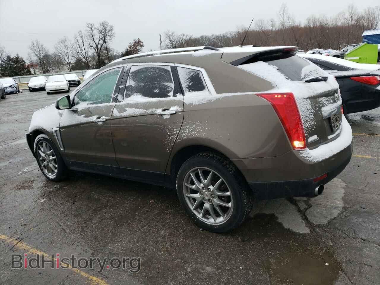 2014 CADILLAC SRX - VIN: 3GYFNGE32ES566257 - Фото 2