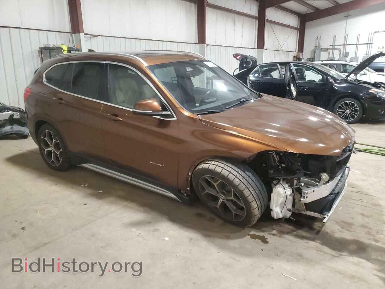2016 BMW X1 - VIN: WBXHT3C33GP881122 - Фото 4
