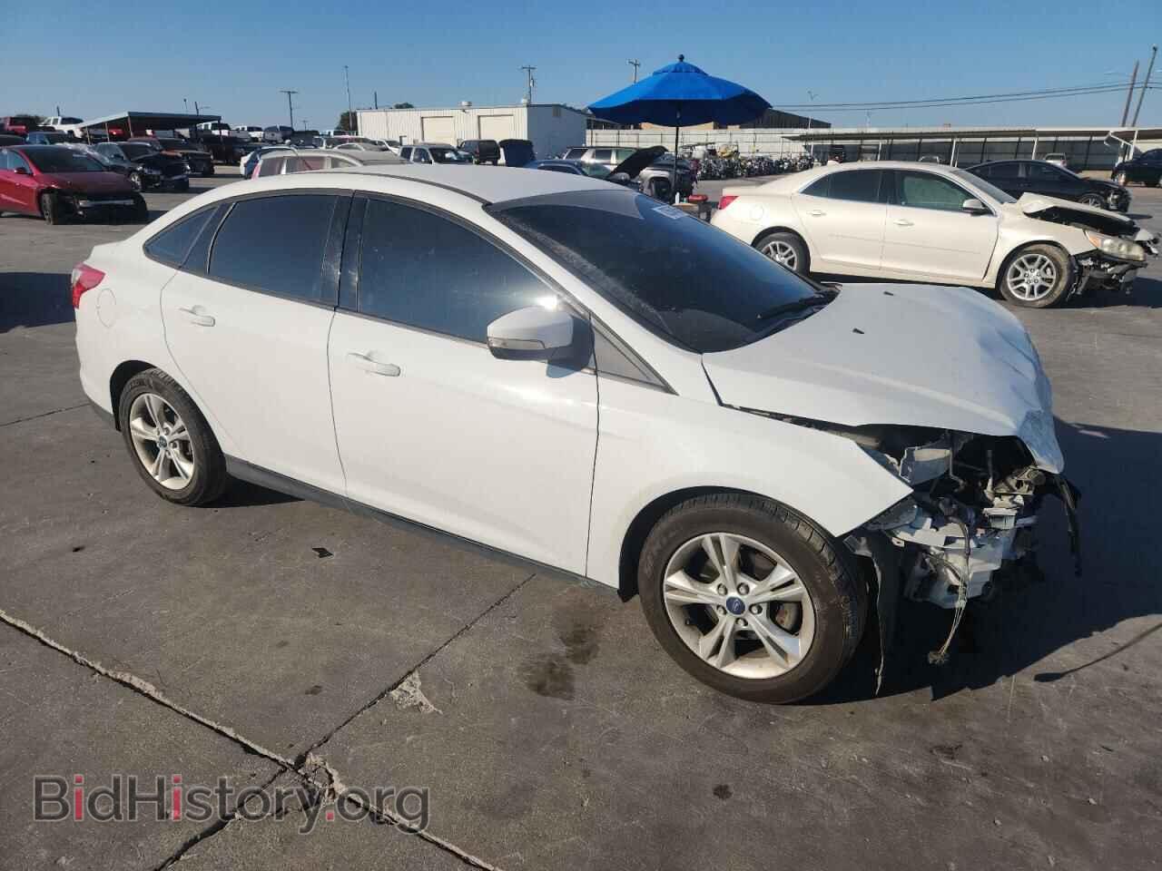 2014 FORD FOCUS - VIN: 1FADP3F24EL148140 - Photo 4