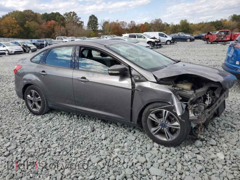 2014 Ford FOCUS (VIN 1FADP3F24EL316097) — photo 4 of 14