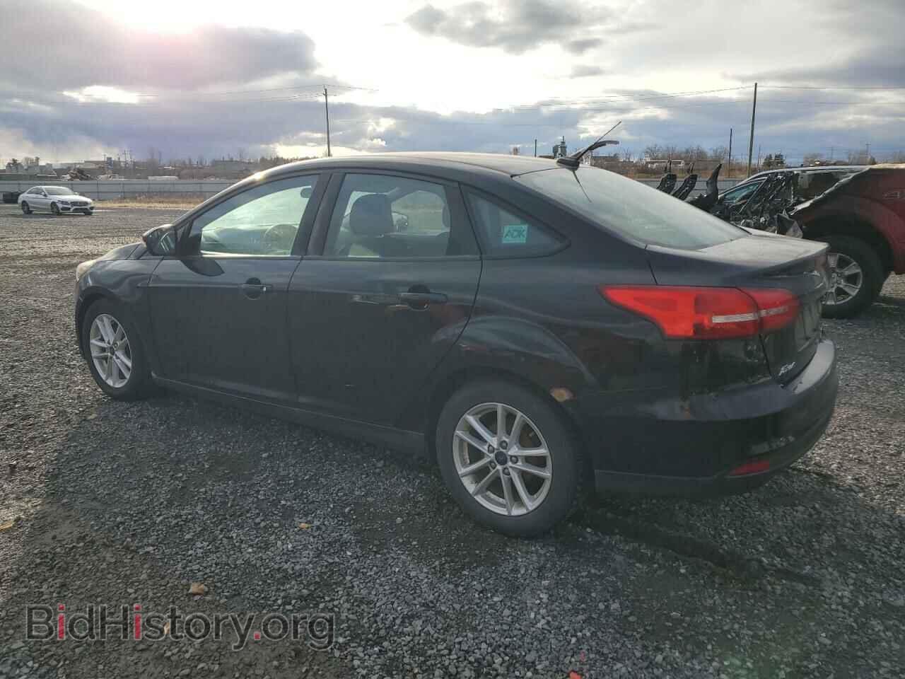 2016 FORD FOCUS - VIN: 1FADP3F21GL316612 - Фото 2