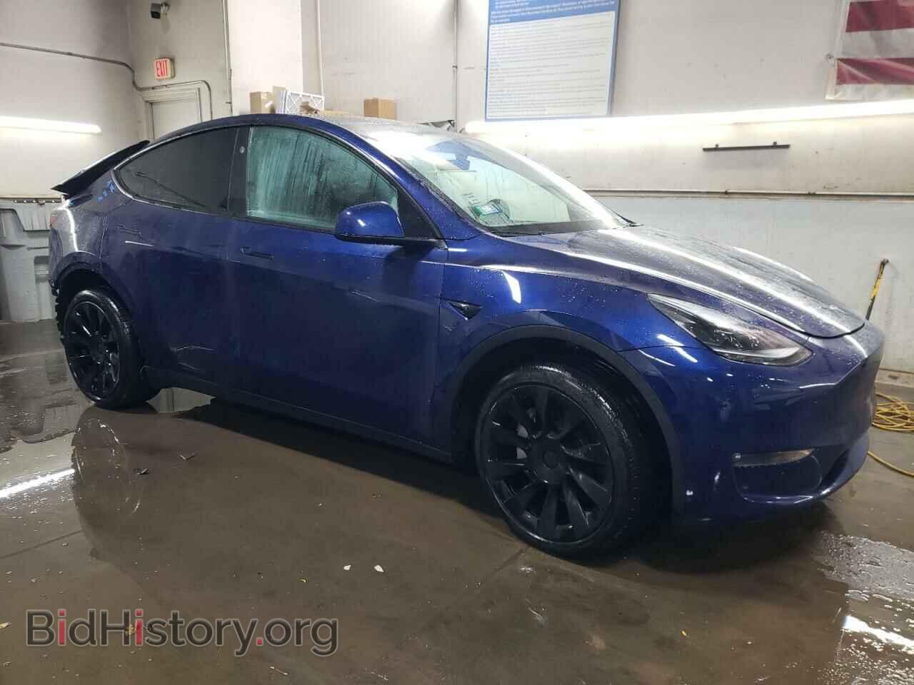 2023 TESLA MODEL Y - VIN: 7SAYGDEE4PF873050 - Photo 4
