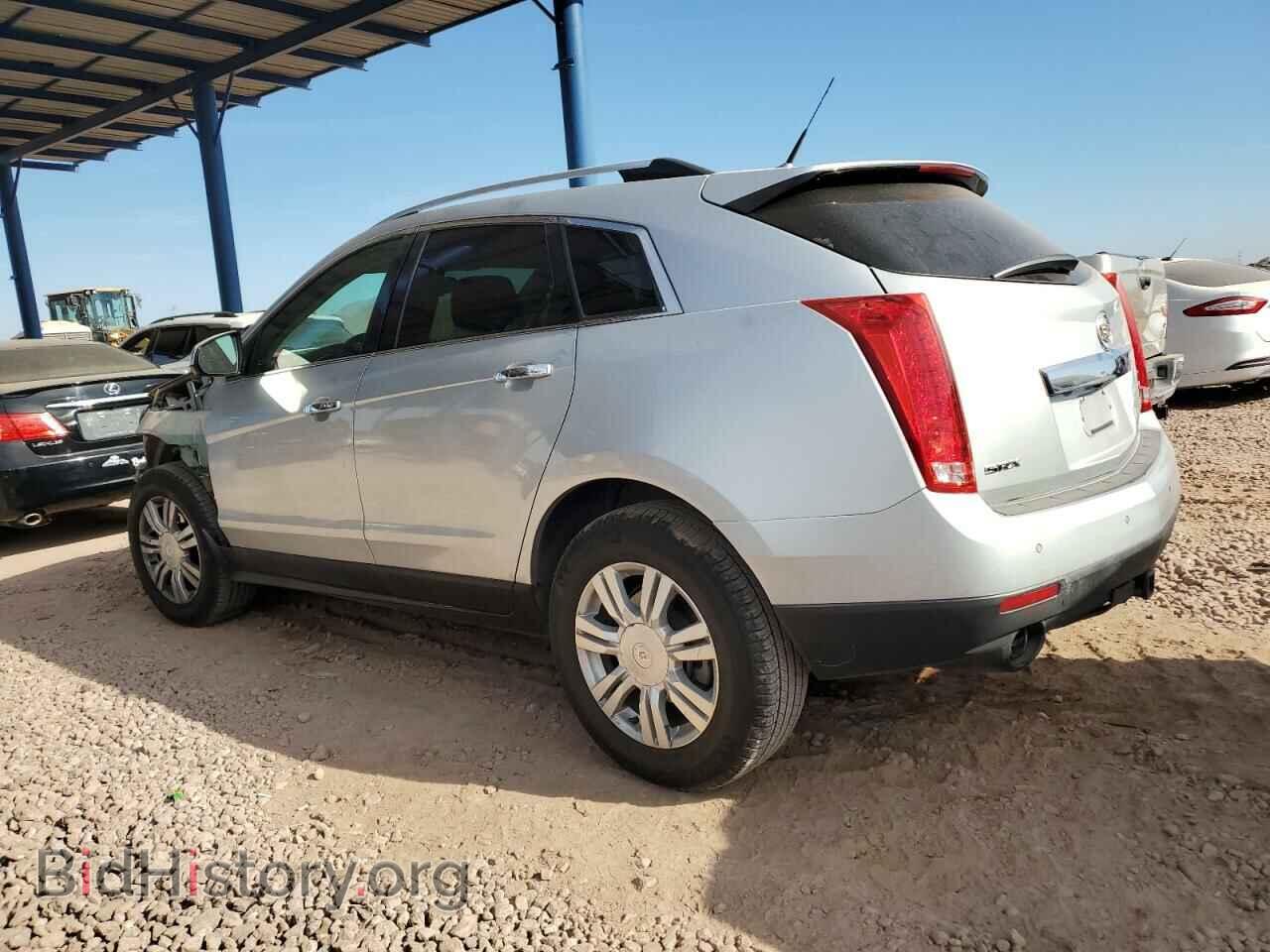 2014 CADILLAC SRX - VIN: 3GYFNBE39ES517852 - Фото 2