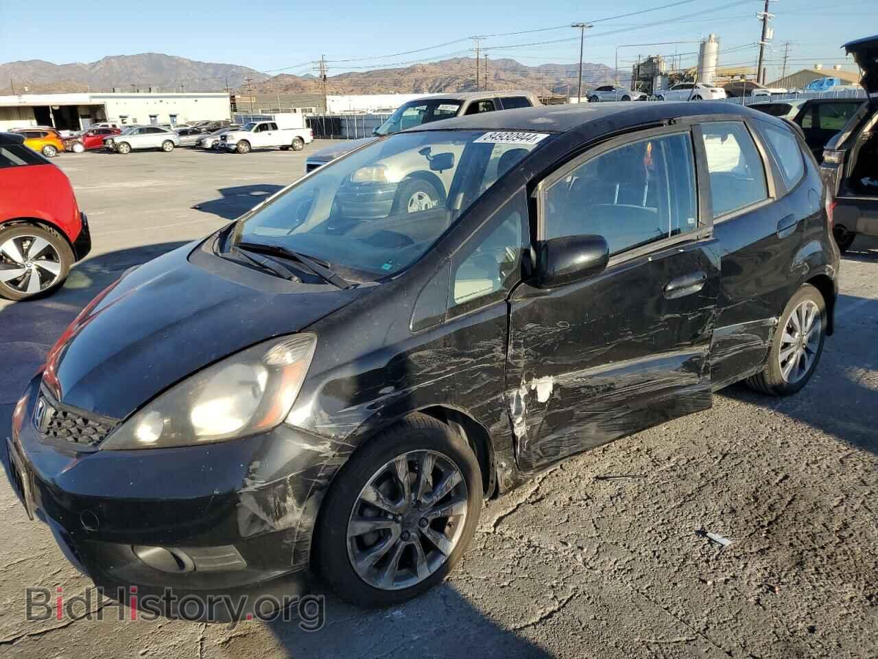 Фотография JHMGE8H58CC040388 - HONDA FIT 2012