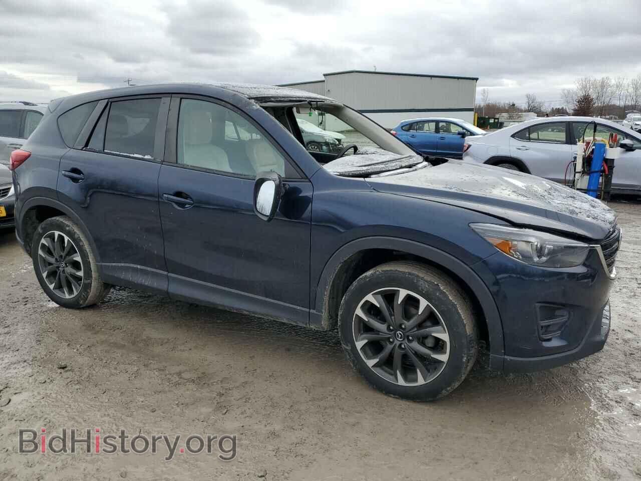 2016 MAZDA CX-5 - VIN: JM3KE4DY3G0672590 - Фото 4