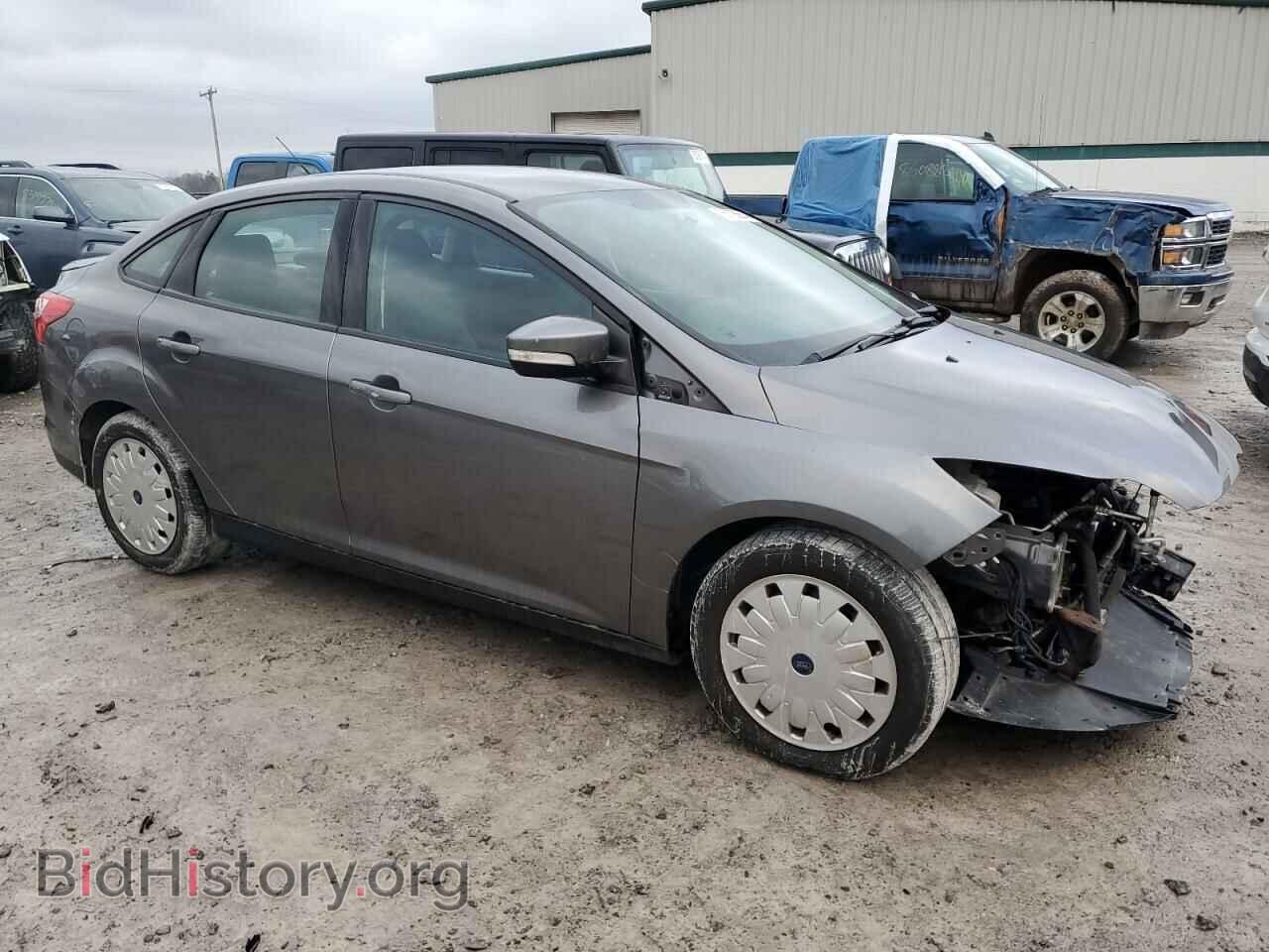 2014 FORD FOCUS - VIN: 1FADP3F23EL217108 - Photo 4