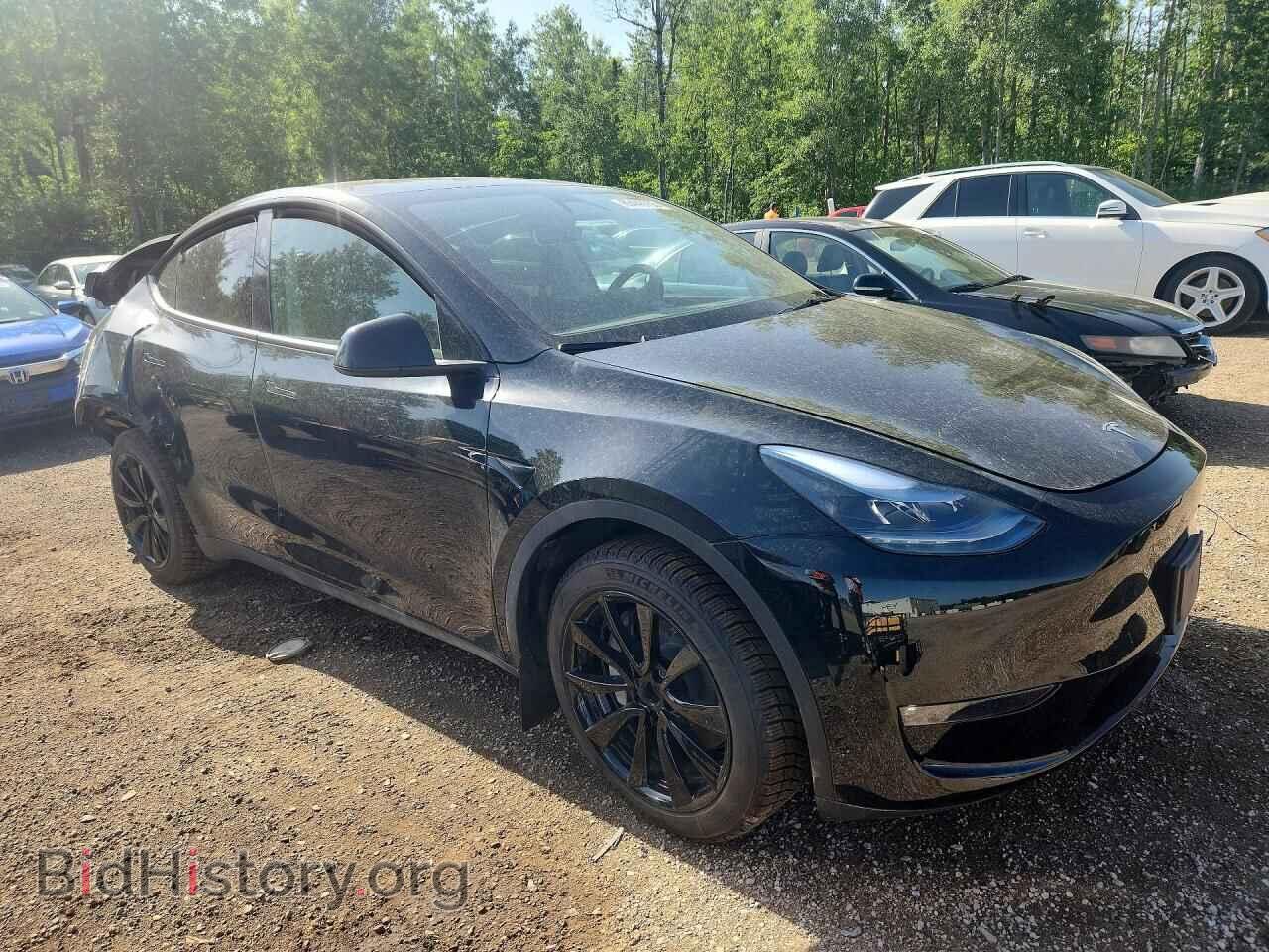 2025 TESLA MODEL Y - VIN: 7SAYGDEE0SF296462 - Photo 4