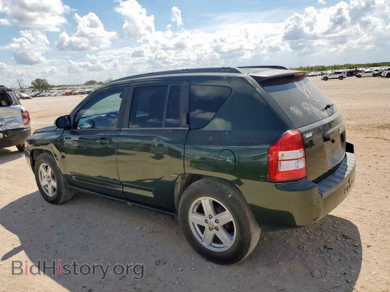 2010 JEEP COMPASS - VIN: 1J4NT4FA0AD659267 - Photo 2