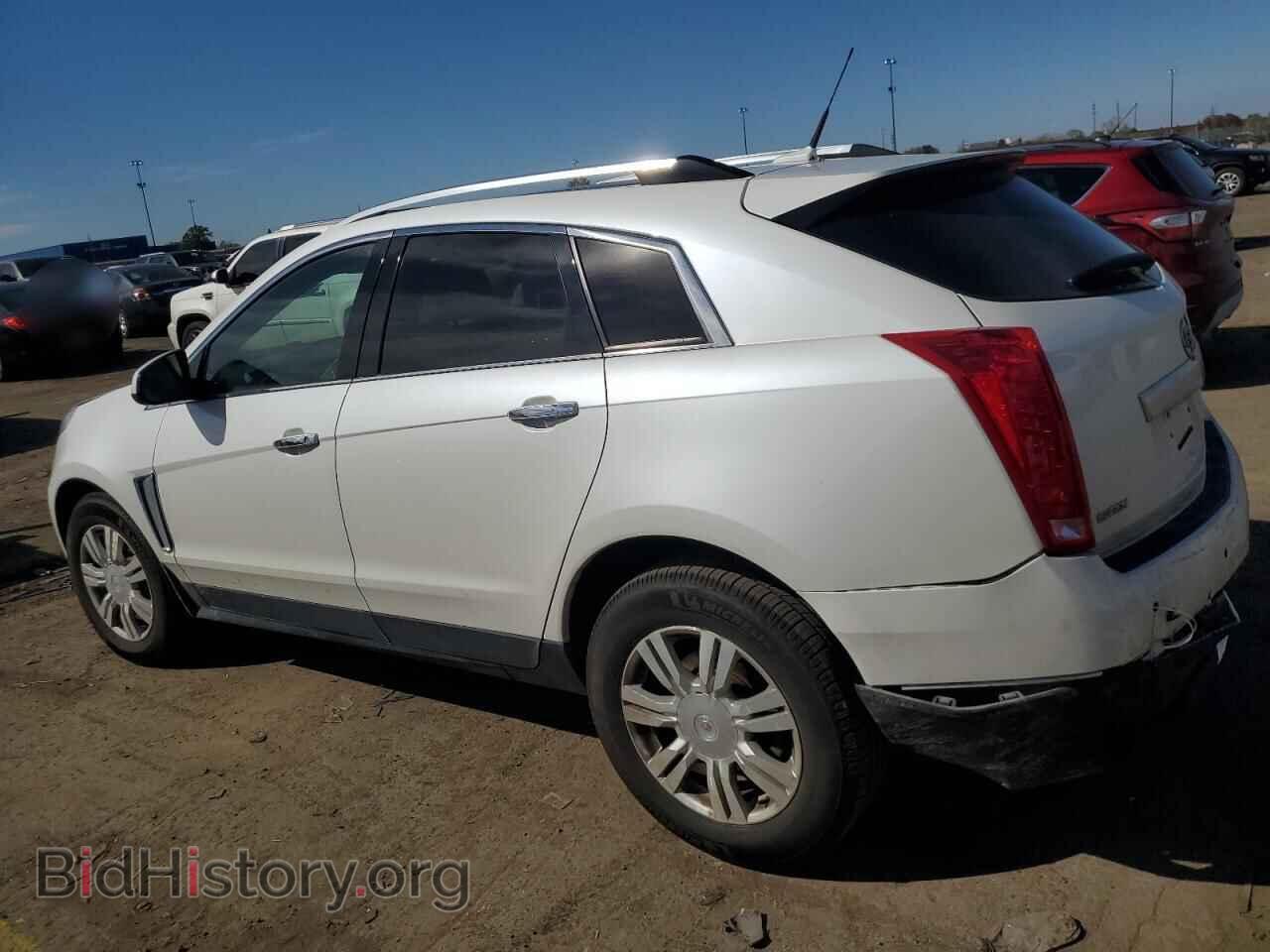 2013 CADILLAC SRX - VIN: 3GYFNCE38DS588545 - Фото 2
