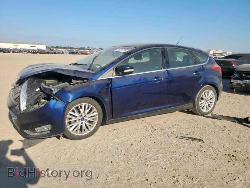 2016 Ford FOCUS Titanium (VIN 1FADP3N26GL318969) — фото 1 из 13, Copart, повреждение: передняя часть