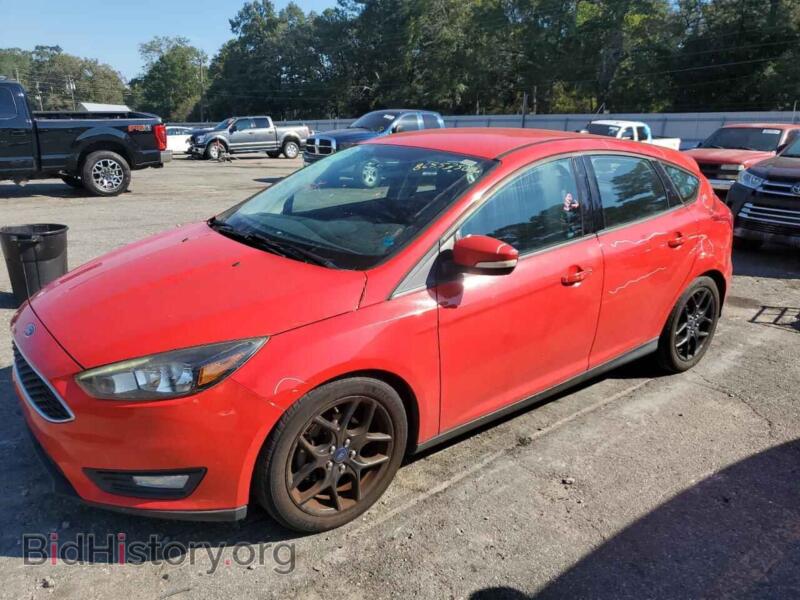 2016 Ford FOCUS SE (VIN 1FADP3K21GL222302) — фото 1 из 12, Copart, повреждение: бок