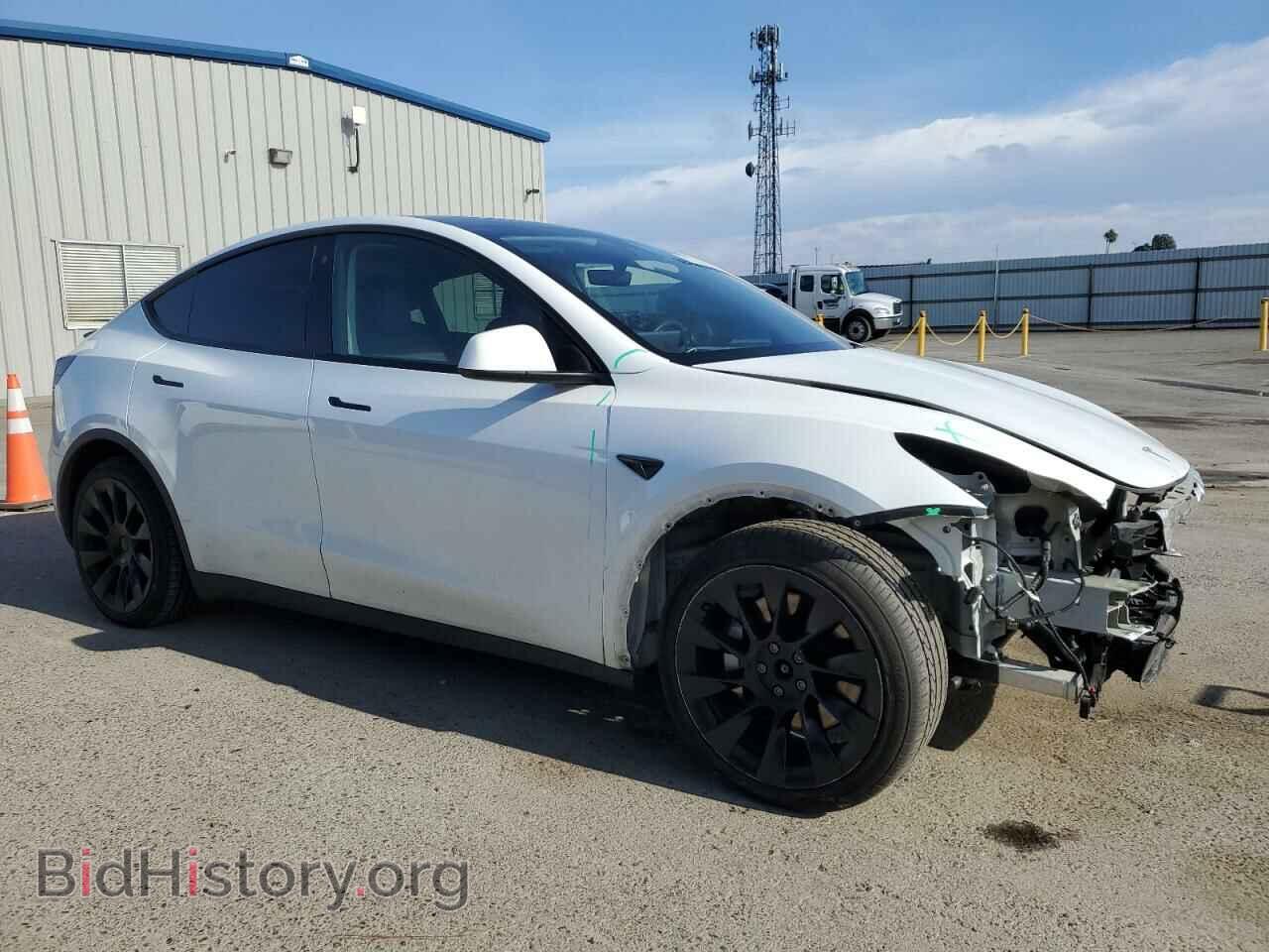 2022 TESLA MODEL Y - VIN: 7SAYGDEE1NF559238 - Photo 4