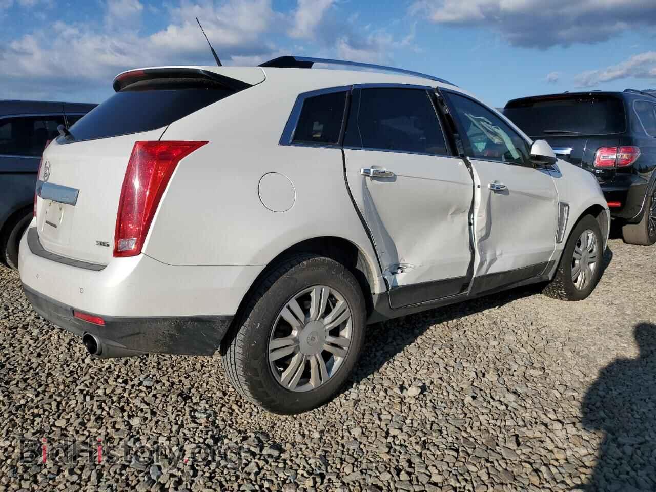 2013 CADILLAC SRX - VIN: 3GYFNCE35DS525886 - Фото 3