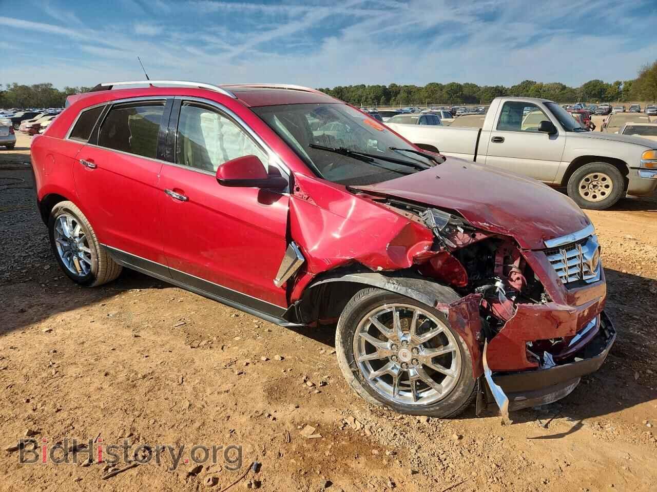2014 CADILLAC SRX - VIN: 3GYFNBE31ES596210 - Фото 4