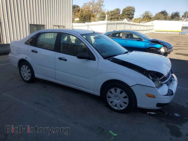 2006 Ford FOCUS (VIN 1FAFP34N06W102830) — фото 4 из 14