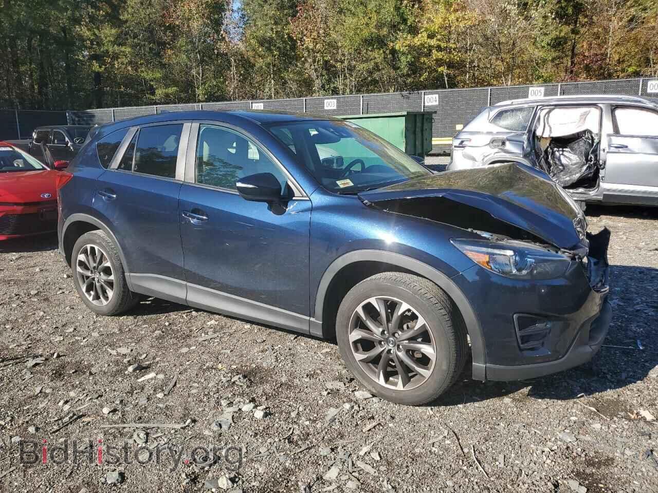2016 MAZDA CX-5 - VIN: JM3KE4DY8G0889200 - Фото 4