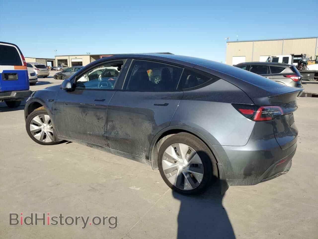 2023 TESLA MODEL Y - VIN: 7SAYGDED2PF949338 - Photo 2