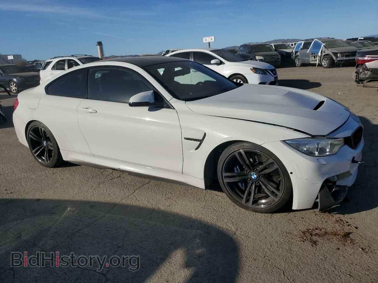 2015 BMW M4 - VIN: WBS3R9C59FK334290 - Фото 4