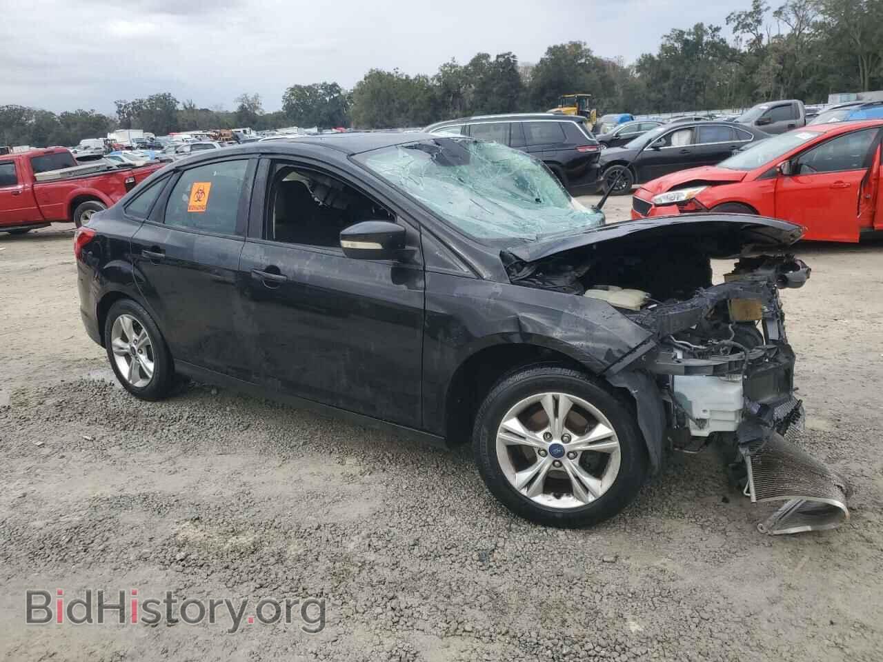 2014 FORD FOCUS - VIN: 1FADP3F23EL301140 - Photo 4