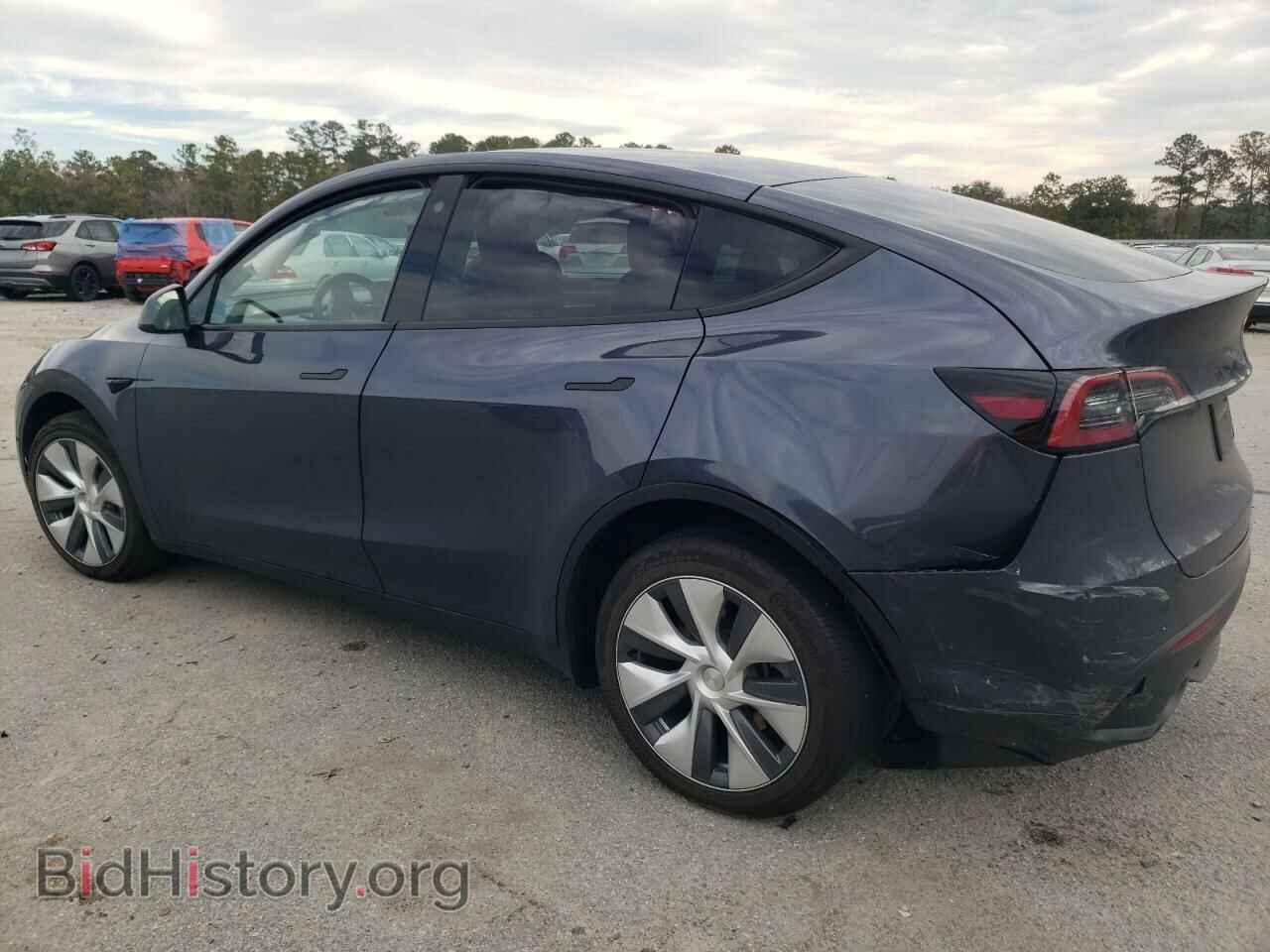 2023 TESLA MODEL Y - VIN: 7SAYGDEE2PA085994 - Фото 2
