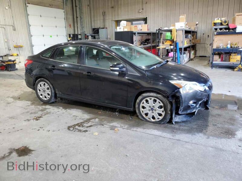 2012 Ford FOCUS (VIN 1FAHP3F28CL103944) — photo 4 of 15