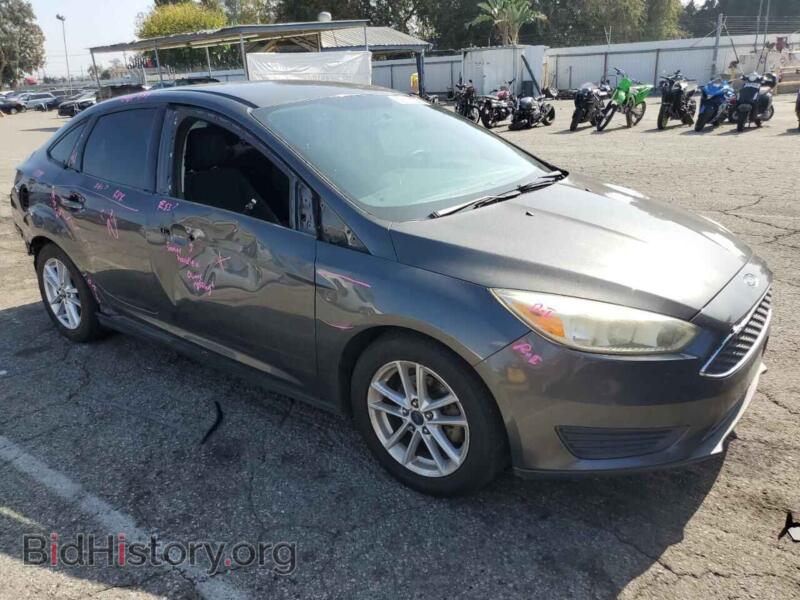 2016 Ford FOCUS (VIN 1FADP3F23GL322136) — фото 4 из 13