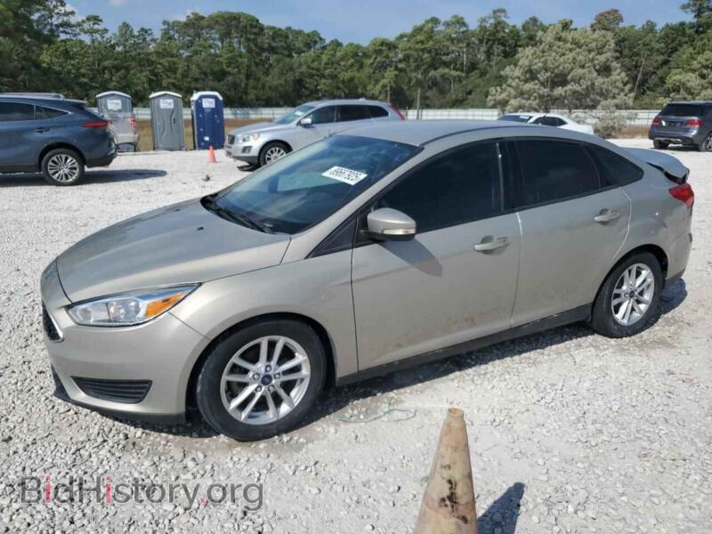 2016 Ford FOCUS SE (VIN 1FADP3F22GL312326) — photo 1 of 14, Copart, damage: rear end